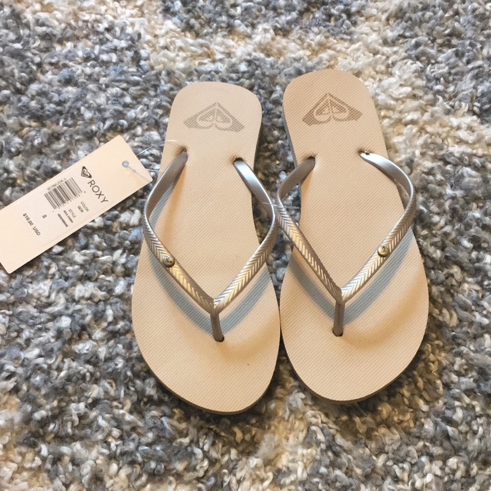 Roxy Tan and gold sandals
